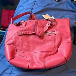 Coach bag with tag inside